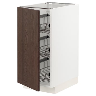 Open kitchen cabinet with dark brown wood door, wire baskets, white frame, sleek design.