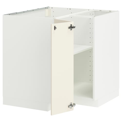 White METOD kitchen cabinet set with off-white bevelled doors, including shelves, made of fiberboard and particleboard.