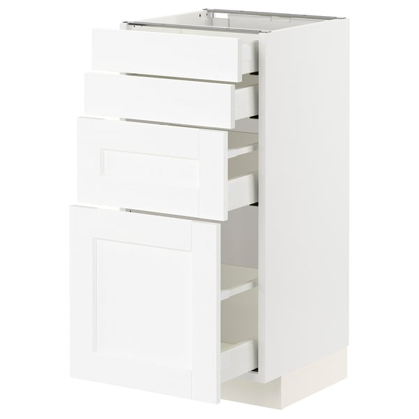 White METOD kitchen cabinet with three smooth-glide drawers and a door, showcasing a classic wood grain design.