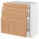 An ikea METOD kitchen unit with light oak drawers and a white base.