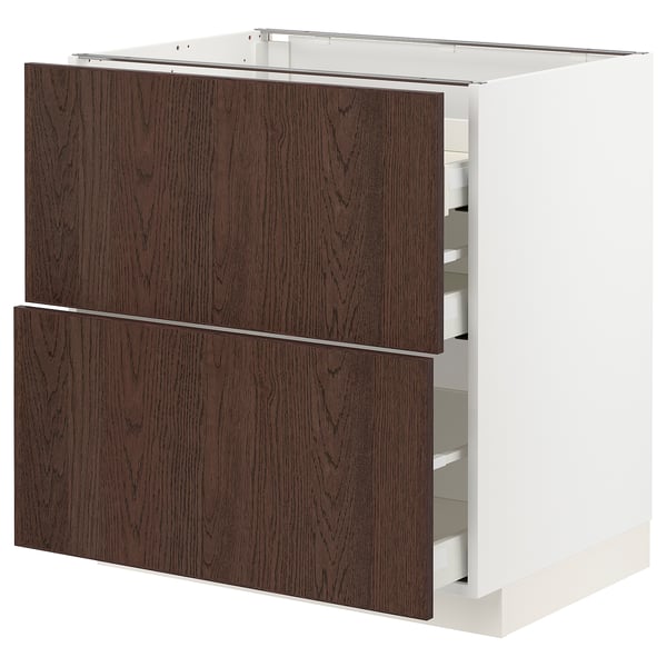 A dark brown METOD kitchen cabinet with oak veneer and solid wood edges, featuring multiple drawers.