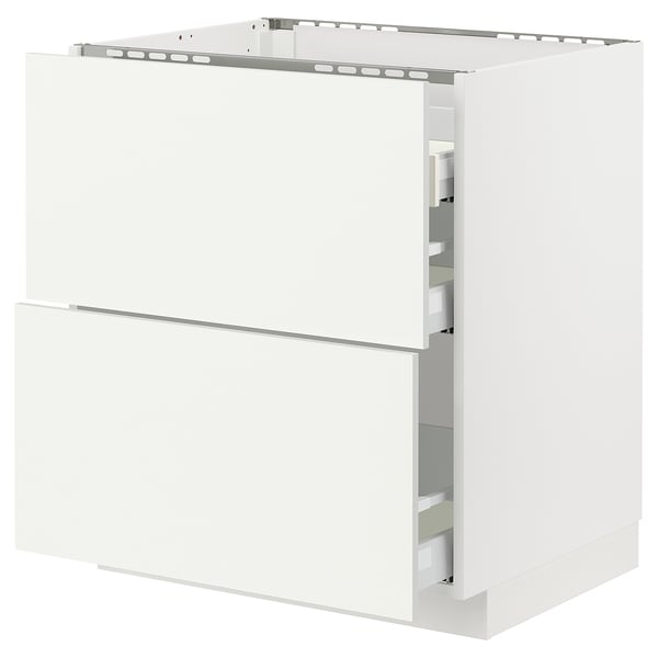 A white METOD kitchen cabinet from IKEA, featuring a sleek design with a drawer and a door.