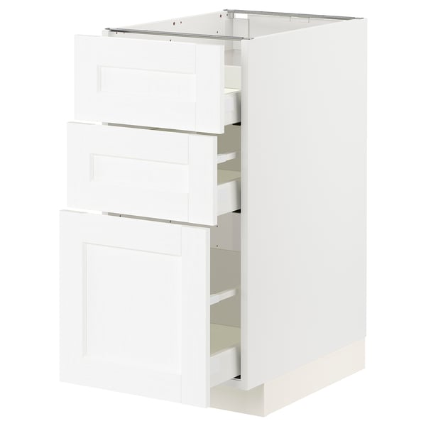 White METOD kitchen cabinet with three open drawers, smooth-running, classic wood look.