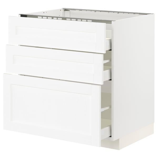 White METOD kitchen cabinet with three pull-out drawers and doors, sleek modern design.