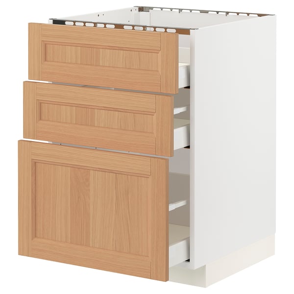 A white and light wood-toned kitchen cabinet from the METOD system, featuring four drawers with oak veneer fronts.