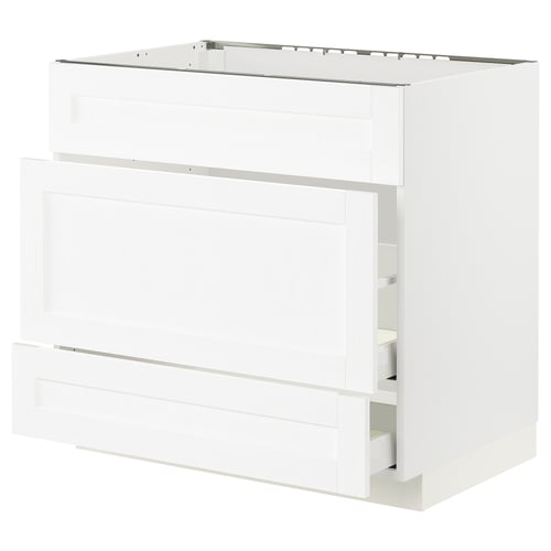 White METOD kitchen cabinet with three drawers and door.