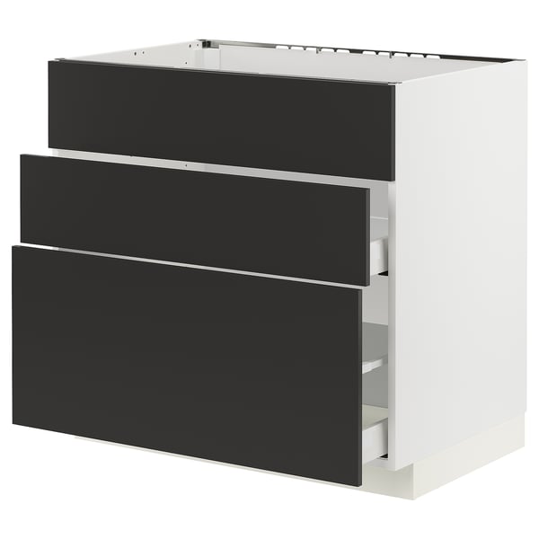 Modern kitchen cabinet in white with black drawers, sleek and minimalist design.