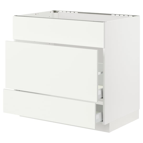 White METOD kitchen cabinet, flat front, two drawers, sleek design.