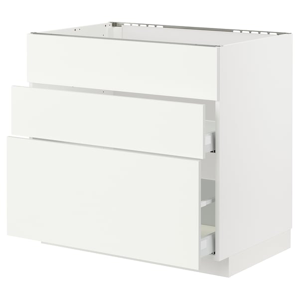 METOD white kitchen cabinet with smooth drawers, sleek design.