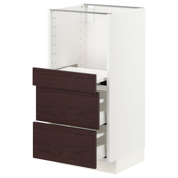 White and dark brown ikea METOD kitchen cabinet with multiple drawers and pull-out shelf.
