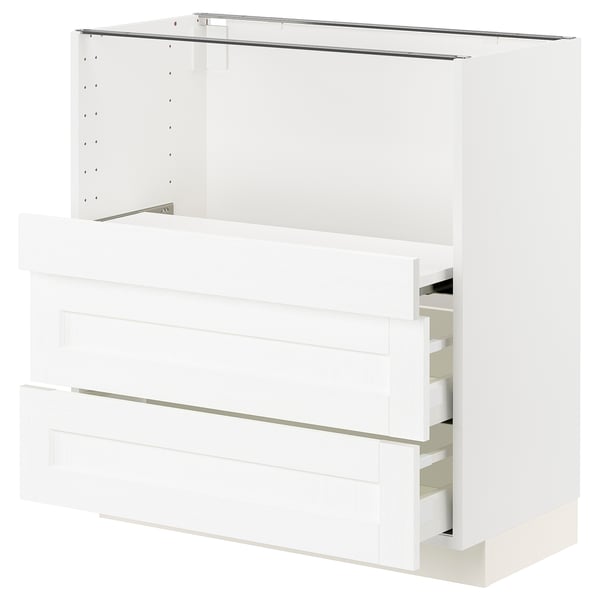 White METOD kitchen cabinet with multiple drawers, sleek design.