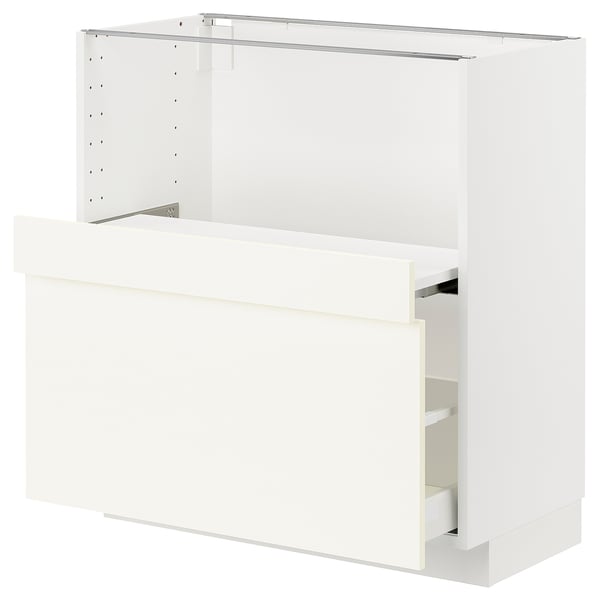 White kitchen cabinet unit, modern design with one open shelf.