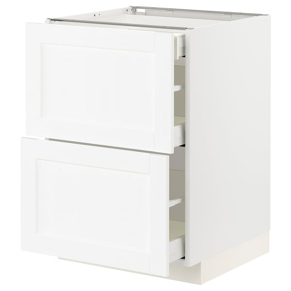 White METOD kitchen cabinet with multiple drawers and door.