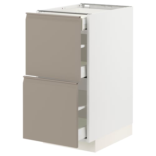 A white METOD kitchen cabinet with two grey-beige drawers featuring integrated handles and a modern design.