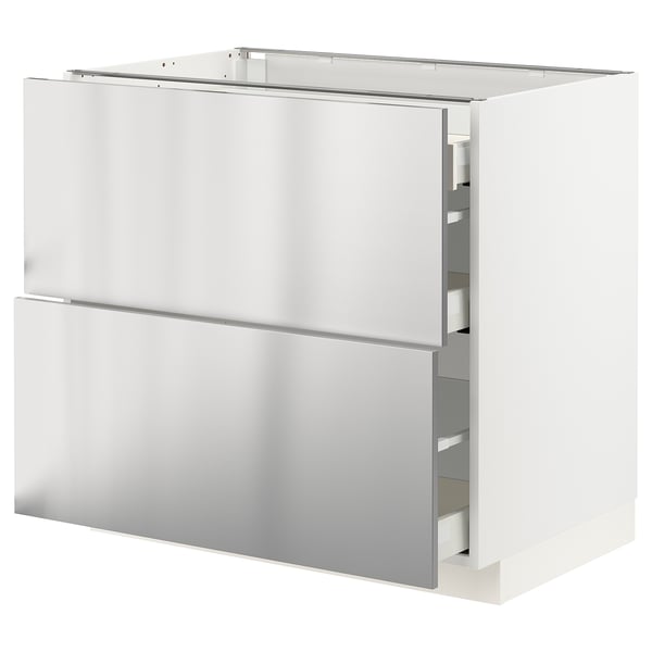 White modern kitchen cabinet with stainless steel drawers and doors.