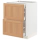 White ikea METOD kitchen cabinet with oak drawers.