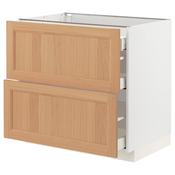 Modern kitchen cabinet with oak and white finish, featuring two pull-out drawers and a flat panel design.
