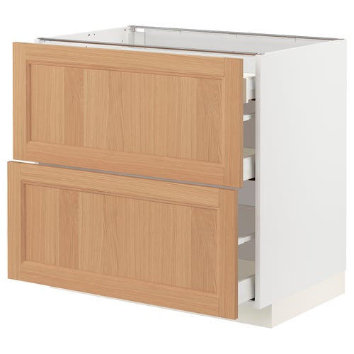 Modern kitchen cabinet with oak and white finish, featuring two pull-out drawers and a flat panel design.