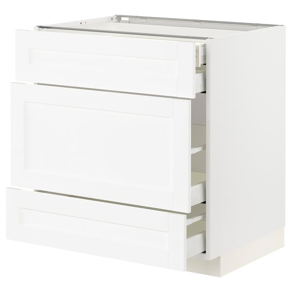 White METOD kitchen cabinet with three drawers, modern design.