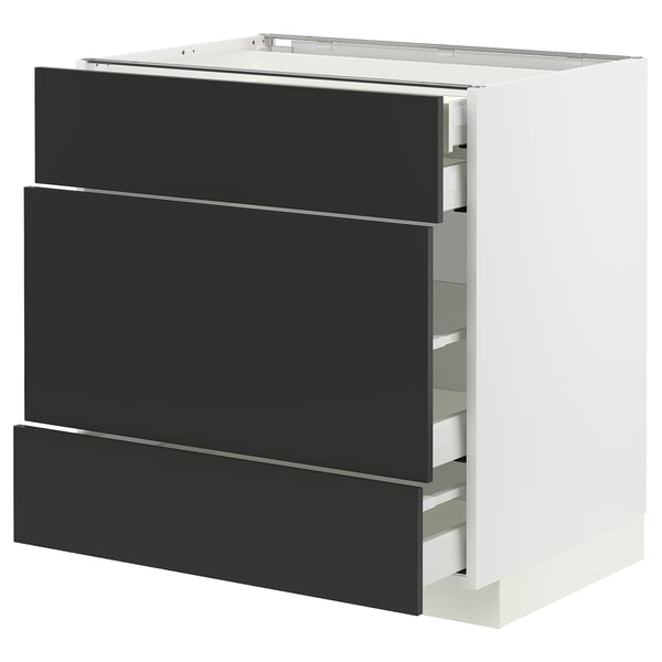 Modular kitchen unit, white with three dark drawer fronts, sleek design.