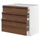 A dark brown wooden drawer unit from IKEAs METOD kitchen system. It three pull-out drawers with a sleek white frame.