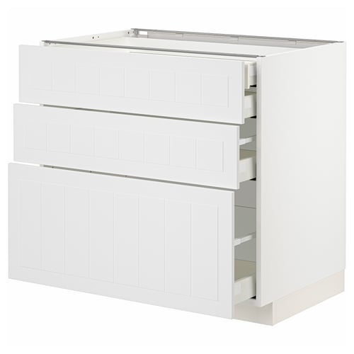 White METOD kitchen cabinet set with three drawers. Modern, crafted look, made from particleboard & steel.