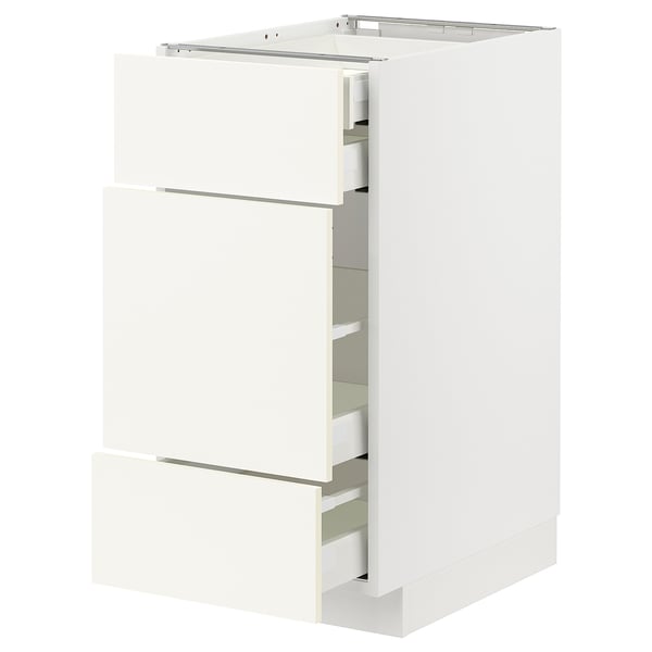 White METOD kitchen cabinet with vallstena fronts, three drawers, sleek minimalist design.