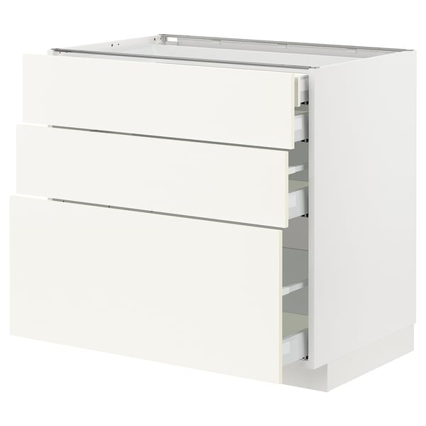 METOD white kitchen cabinet with three drawers, sleek modern design.