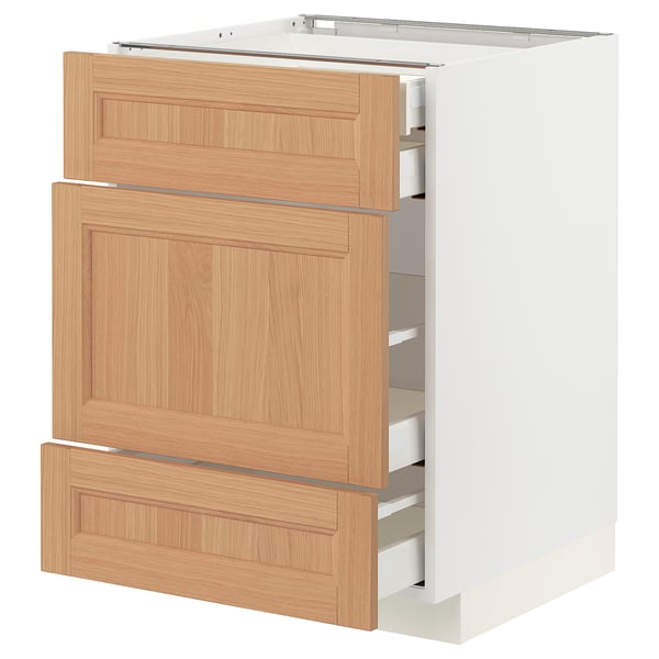An ikea METOD kitchen cabinet with oak drawers. It has a white and natural wood design, featuring three drawers and a sleek, modern look.