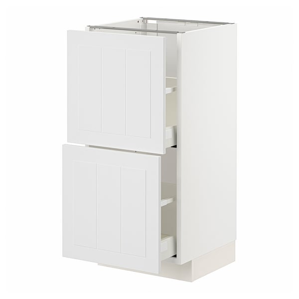 White METOD kitchen cabinet with wooden panels and two drawers.