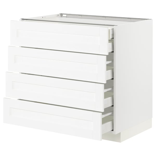 White METOD kitchen cabinet with four drawers, sleek design, metal handles.