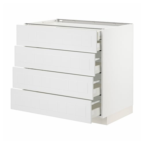 White METOD kitchen system, featuring four smooth drawer units, sleek crafted design.