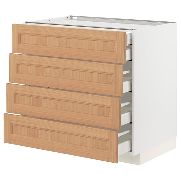 White and oak METOD kitchen cabinet with smooth, pull-out drawers.