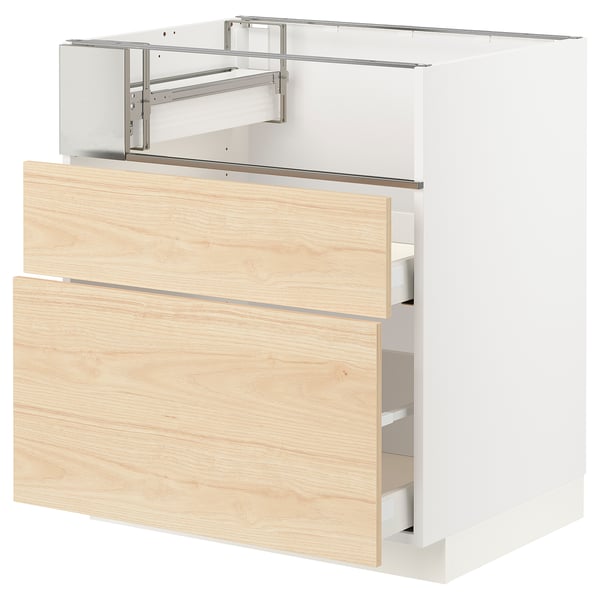 A light ash-colored kitchen cabinet with a drawer, part of the METOD kitchen system, featuring a modern and simple design made of engineered wood.