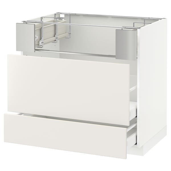 A white METOD kitchen cabinet with smooth, clean lines and full-extension drawers.
