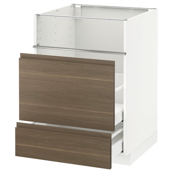 White kitchen cabinet with walnut drawers, modern design.