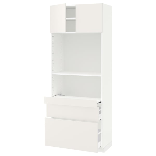White METOD kitchen unit, modern design with shelves and drawers.