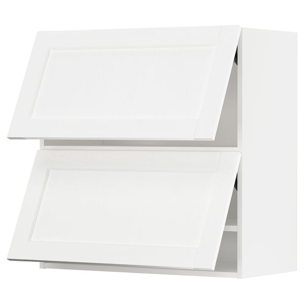A white METOD wall cabinet with two doors. The cabinet has a sleek, rectangular design with a subtle grain texture.