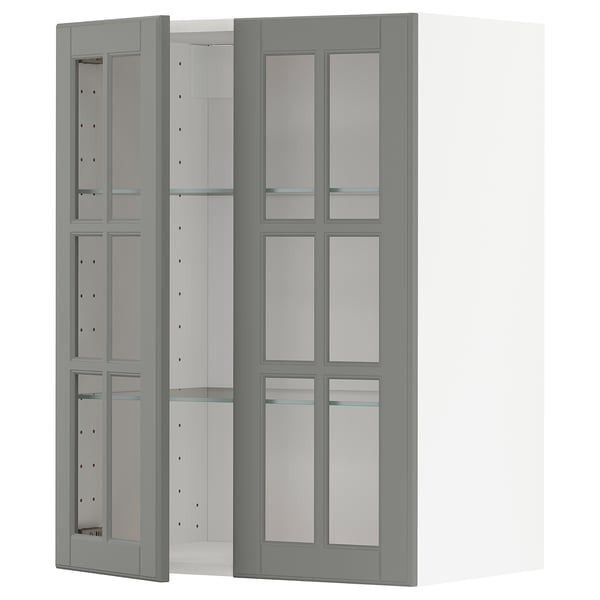 Grey METOD kitchen cabinet with glass doors and bevelled edges.