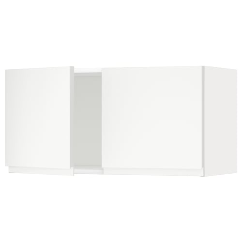 White minimalist METOD kitchen system: includes wall cabinets with clean lines and integrated handles.