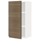 Modern white cabinet with dark wood door, minimalist design, single shelf.