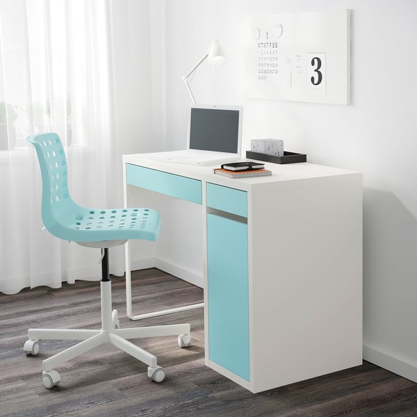A white desk with blue accents and a blue chair. It includes adjustable shelves and cable management.