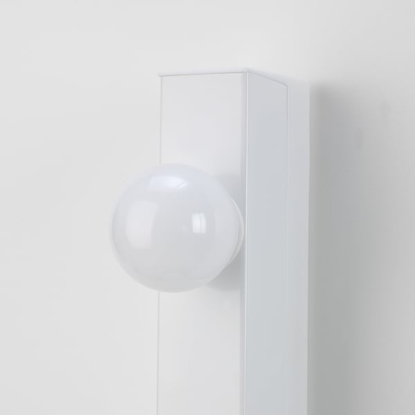 Modern wall lamp with spherical globe on minimalist base.