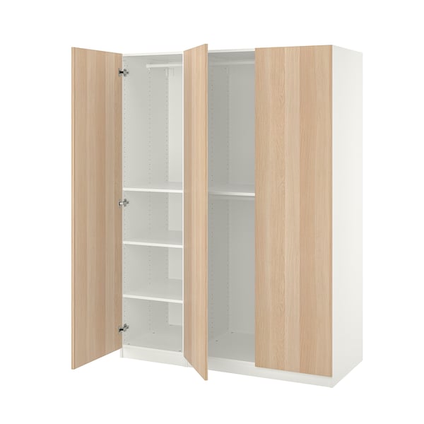 White PAX wardrobe with light wooden doors, adjustable shelves, and soft closing hinges.
