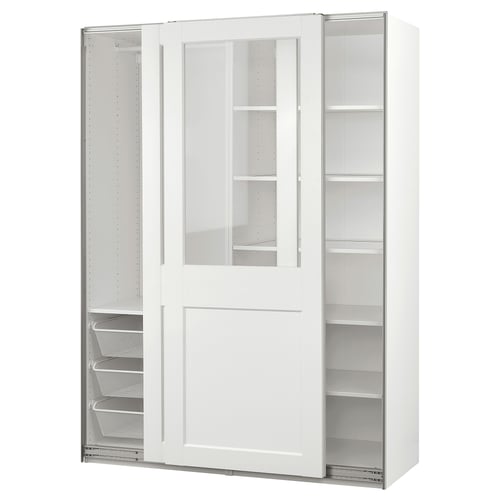 Modern white PAX wardrobe with clear glass doors clothes. Mesh baskets and adjustable shelves. Sleek, sliding door design.