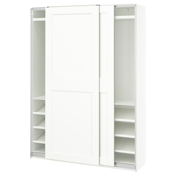 A white PAX wardrobe with sliding doors and internal shelves.