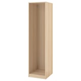 Light-colored ikea PAX wardrobe frame with adjustable feet for custom storage.
