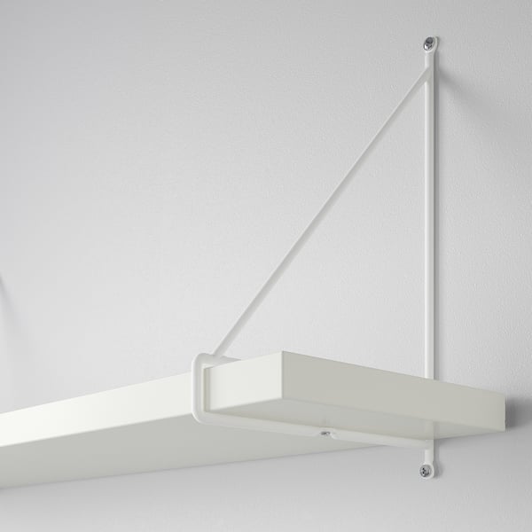 White wall-mounted shelf with metal brackets, securely fastened to wall, minimalist design.