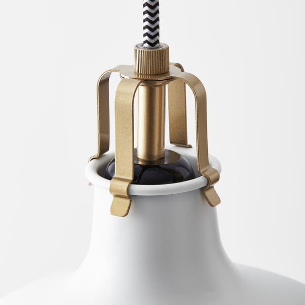 Modern lamp featuring gold metal lid and white base, showcasing sturdy craftsmanship.