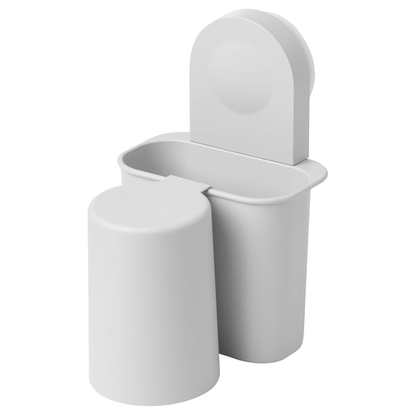 Grey bathroom organiser with curved lid and cup holder, sticks with suction cups.